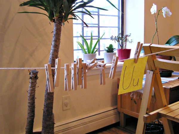 Combine early literacy and fine motor skills with this clothespin alphabet activity. 