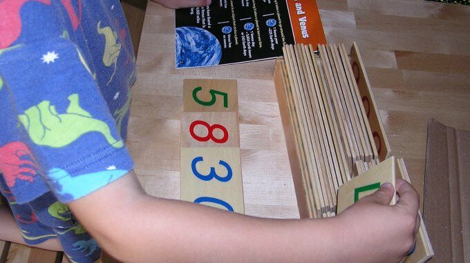 Playing with montessori number cards