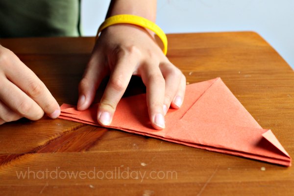 Folding paper boats and crafting with kids