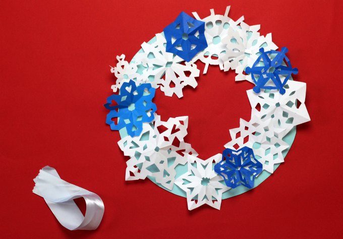 Position snowflakes on wreath