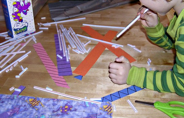 Fine motor activity for kids cutting straws with scissors