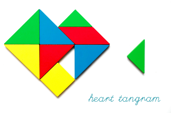 Heart tangram with colorful wooden blocks
